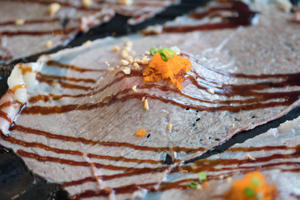 Sliced beef sushi with sauce and fish roe - japanese food style