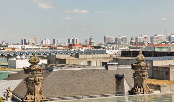 Reichstag roof with Berlin cityscape. Mitte district, Germany