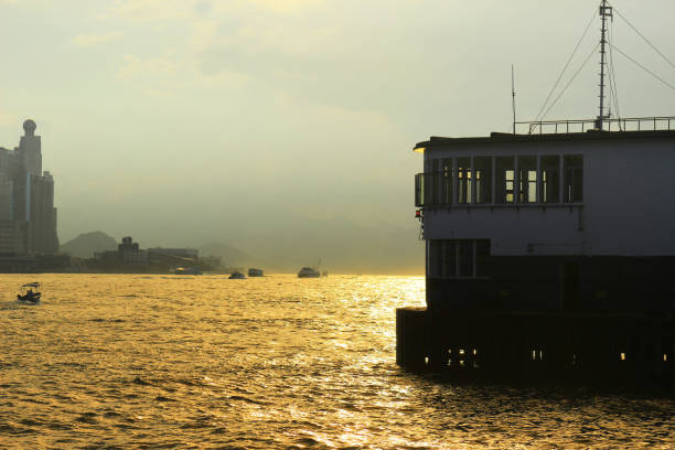istock Traditional ferry boat at Kowloon island. 1125061224