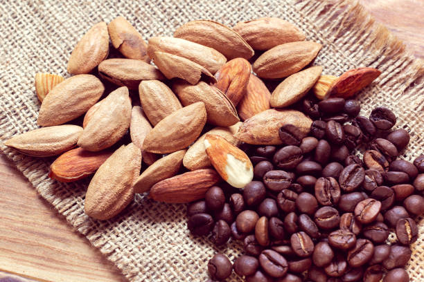 istock almond and grains of coffee 1125067155