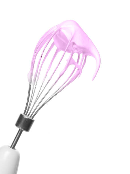 istock Wire whip and cooking pink meringue. 1125067161