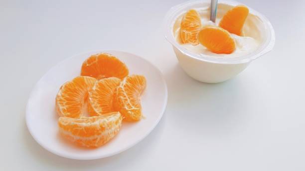 istock Tangerina and yogurt 1125068832