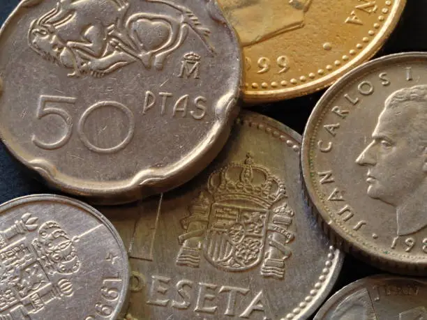 Photo of various former spanish pesetas coins before euro