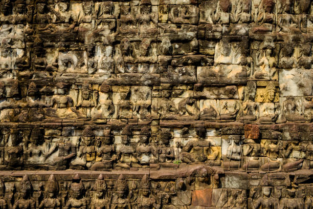 Reliefs of old ancient temple background stock photo