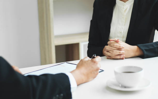istock Business concept - Executives at desk discussion sales performance in a office. 1125076110