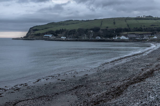 istock Sunrise in Carnlough bay 1125077366