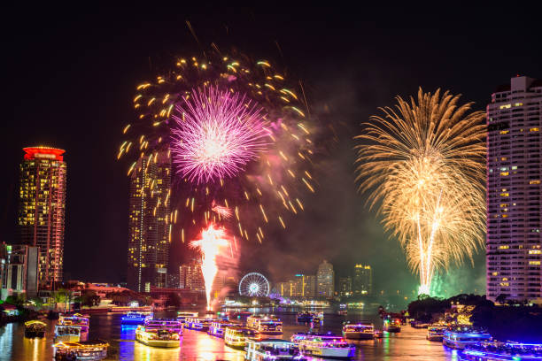 istock high building of city view reflections  with fireworks 1125081260