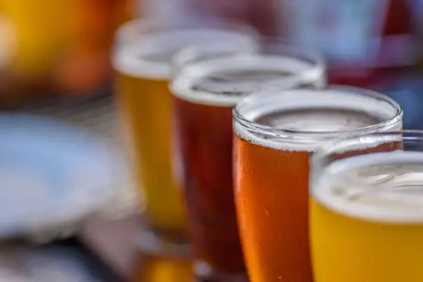 Photo of Beer flight at outdoor beer garden in summertime