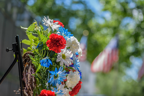 Closeup of red white and blue flowers at park on Memorial Day in USA