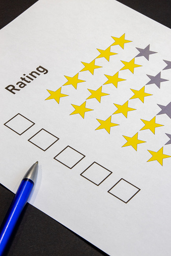 Rating with 5 stars selection with black Background and Pen in English