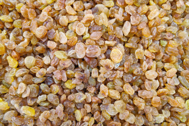 istock Stack of organic dried golden raisins 1125111868