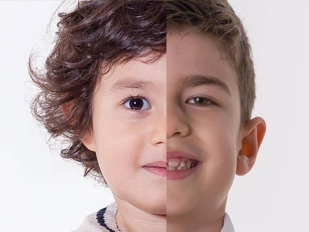 istock Happy boy with double face expression isolated on white background 1125114923