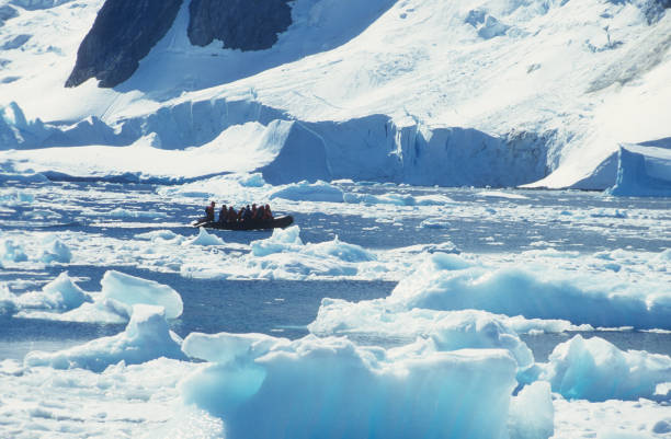istock Exploring the coast by zodiac 1125115035