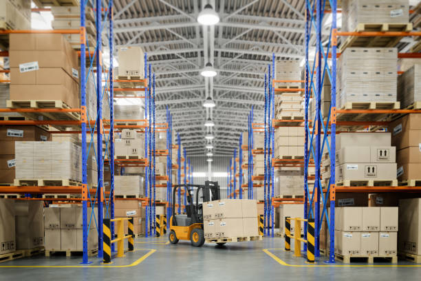 forklift truck in warehouse or storage and shelves with cardboard boxes. - warehouse forklift distribution warehouse merchandise imagens e fotografias de stock