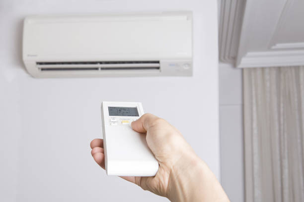 istock Remote control directed on air conditioner systrem. 1125127684