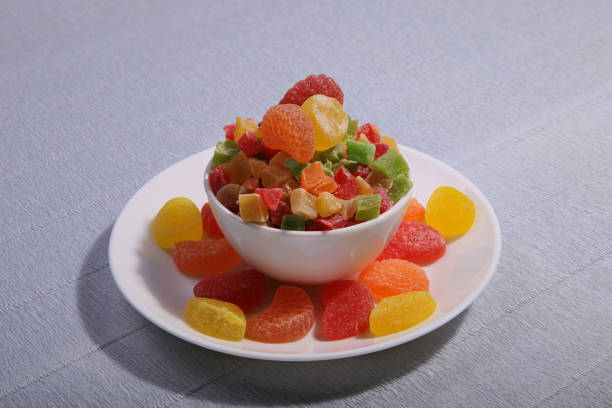 istock Plates with sweets. Marmalade and candied fruit. 1125129194
