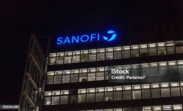 Night Sanofi Office Building In Berlin Germany Stock Photo - Download Image Now - Sanofi, City, Logo