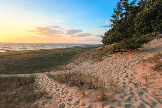 istock Winding Path On A Sunset Beach On Lake Michigan 1125147307