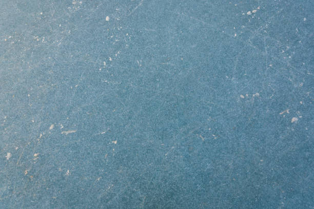 istock Light blue ice texture with skate scratches 1125156693