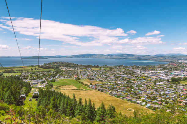 Rotorua town and lake view and cable car to the top of the hill Rotorua town and lake view and cable car to the top of the hill rotorua luge stock pictures, royalty-free photos & images
