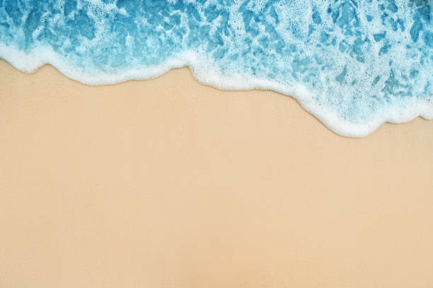 istock Background of Soft Blue Ocean Wave On Sandy Beach. 1125158935