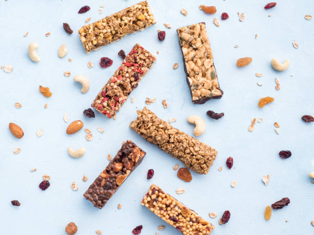 istock Set of different granola bars on blue background 1125177012