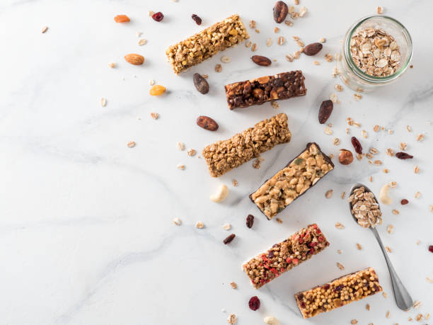 conjunto de barritas diversas - protein bar cereal oat cranberry fotografías e imágenes de stock