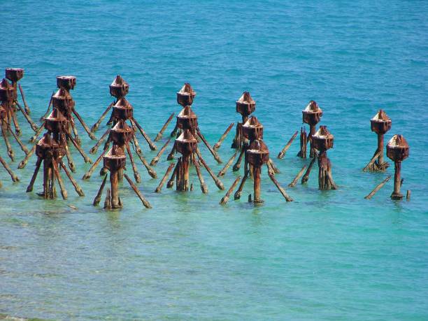 istock Turquoise Water and metal pier 1125188208