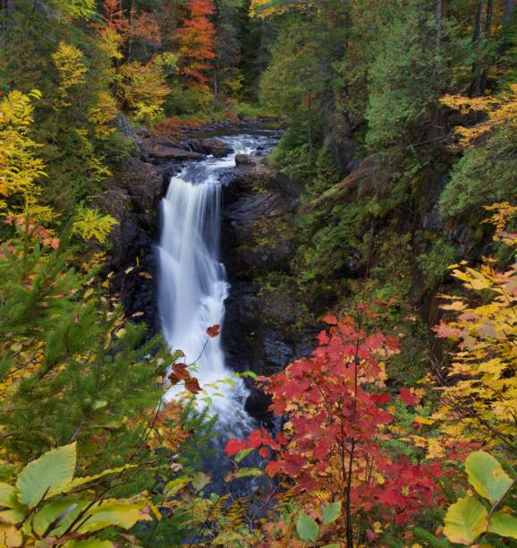 Moxie Falls in Maine USA surrounded by fall foliage