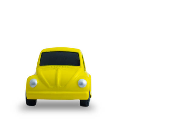istock small yellow metal car isolated on white background 1125194711