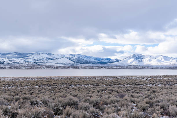 istock Desert landscape in winter with snow covered mountains 1125200158