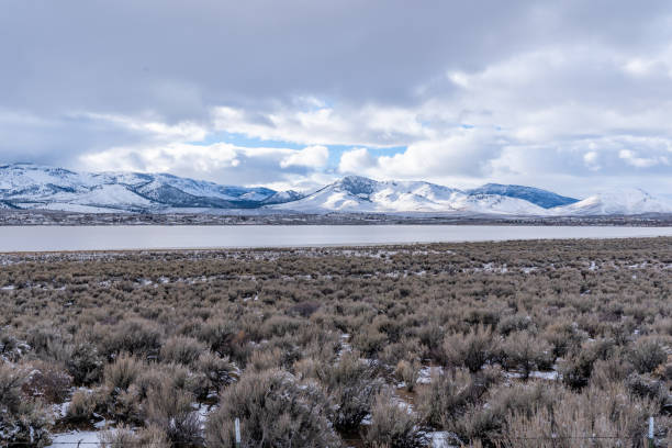istock Desert landscape in winter with snow covered mountains 1125200221