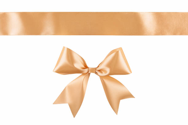 istock Gold beige ribbon bow isolated on white background 1125208924
