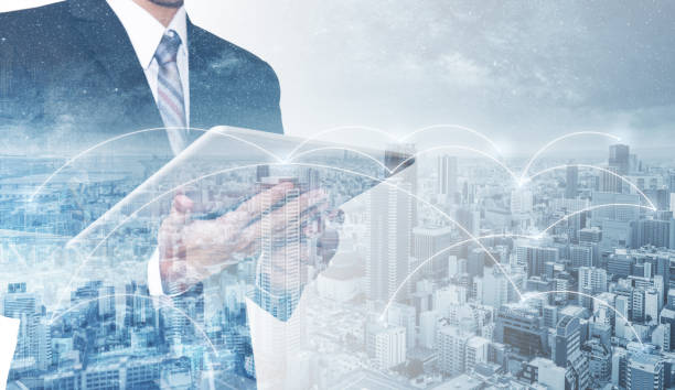 istock Business network, blockchain technology and internet connection. Double exposure businessman using digital tablet, and cityscape 1125208976