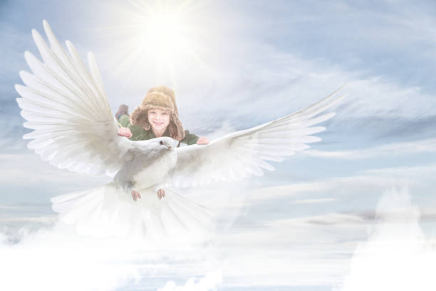 istock Boy flying on bird's wings 1125213750
