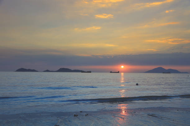 Beautiful summer golden sunset  at Lung Kwu Tan