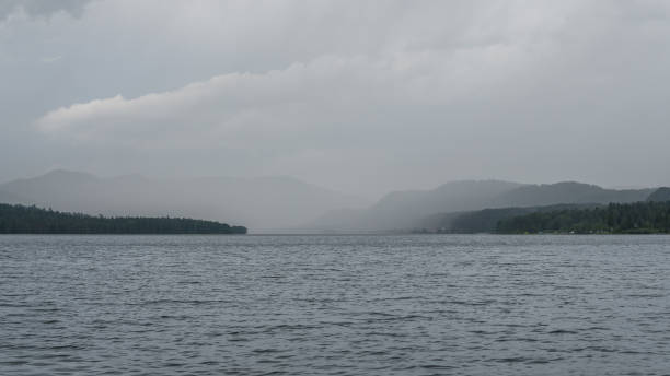 istock rain on the lake. oncoming rain. 1125228347
