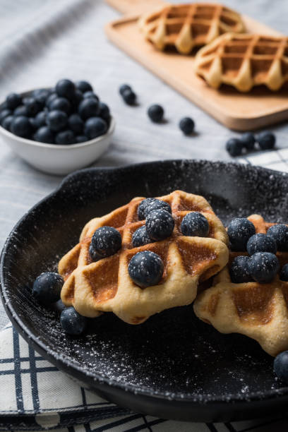 istock Belgium waffle with blueberry on pan 1125241536