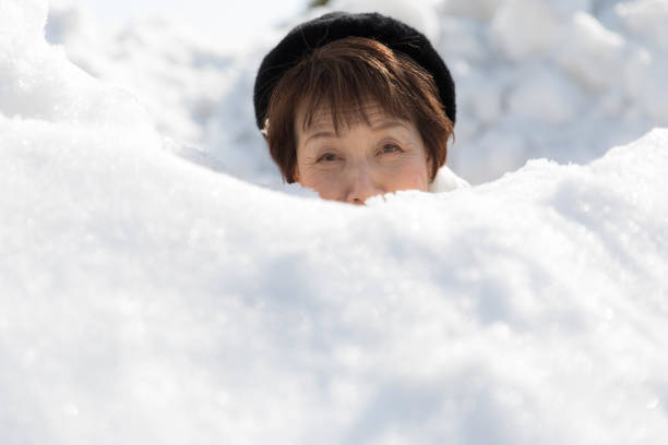 Japanese woman having fun in snow