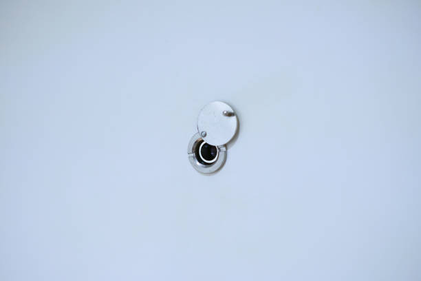 istock White Door Peep Hole 1125249027