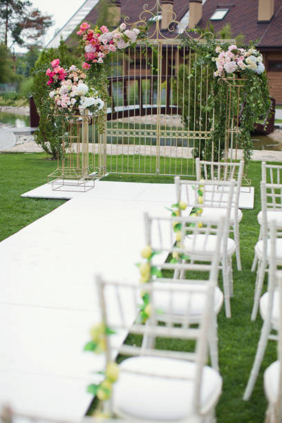 istock wedding arch with flowers 1125249208