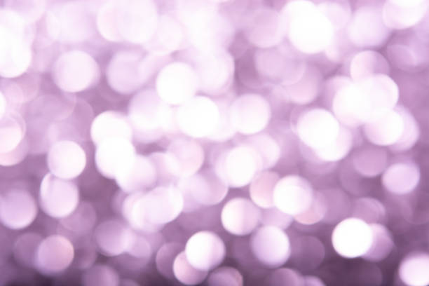 istock Bokeh lights violet texture. Beauty concept luxury background. 1125252960