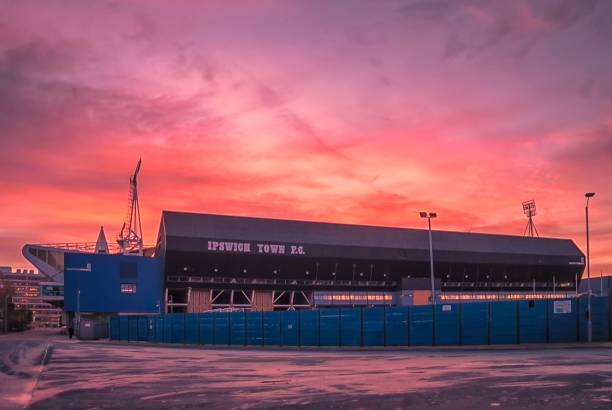 A brilliant sky as the sun rise of Portman Road stadium in Ipswich, UK stock photo