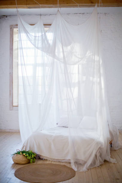 istock cozy bedroom in white colors 1125256502