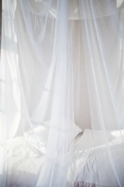 istock cozy bedroom in white colors 1125256533