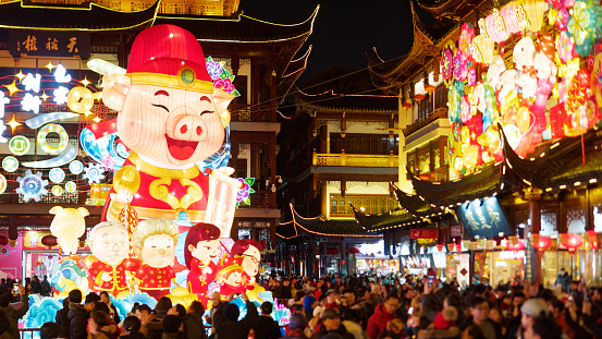 Shanghai, China - Jan. 26, 2019: Lantern Festival in the Chinese New Year( Pig year), night view of colorful lanterns and crowded people walking in Yuyuan Garden.
