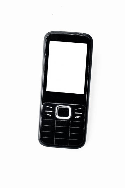 istock Black colored Mobile phone or cell phone or keypad cell phone or keypad mobile phone isolated on white. 1125263545