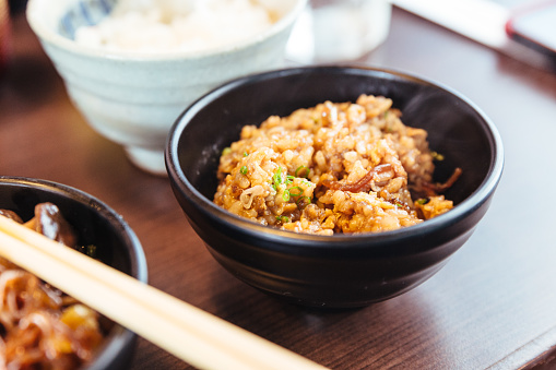 Rice stir fried with sukiyaki soup. Salty-sweet flavors of Shoyu sauce, Wagyu beef, pork and vegetables from sukiyaki hot pot.