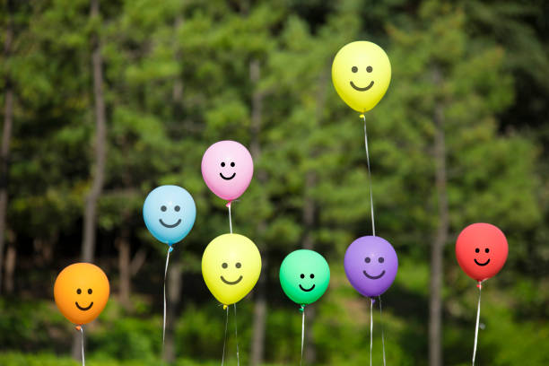 istock multicolored balloons in the forest. 1125268211