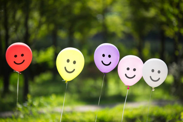 istock multicolored balloons floating in the forest 1125268328